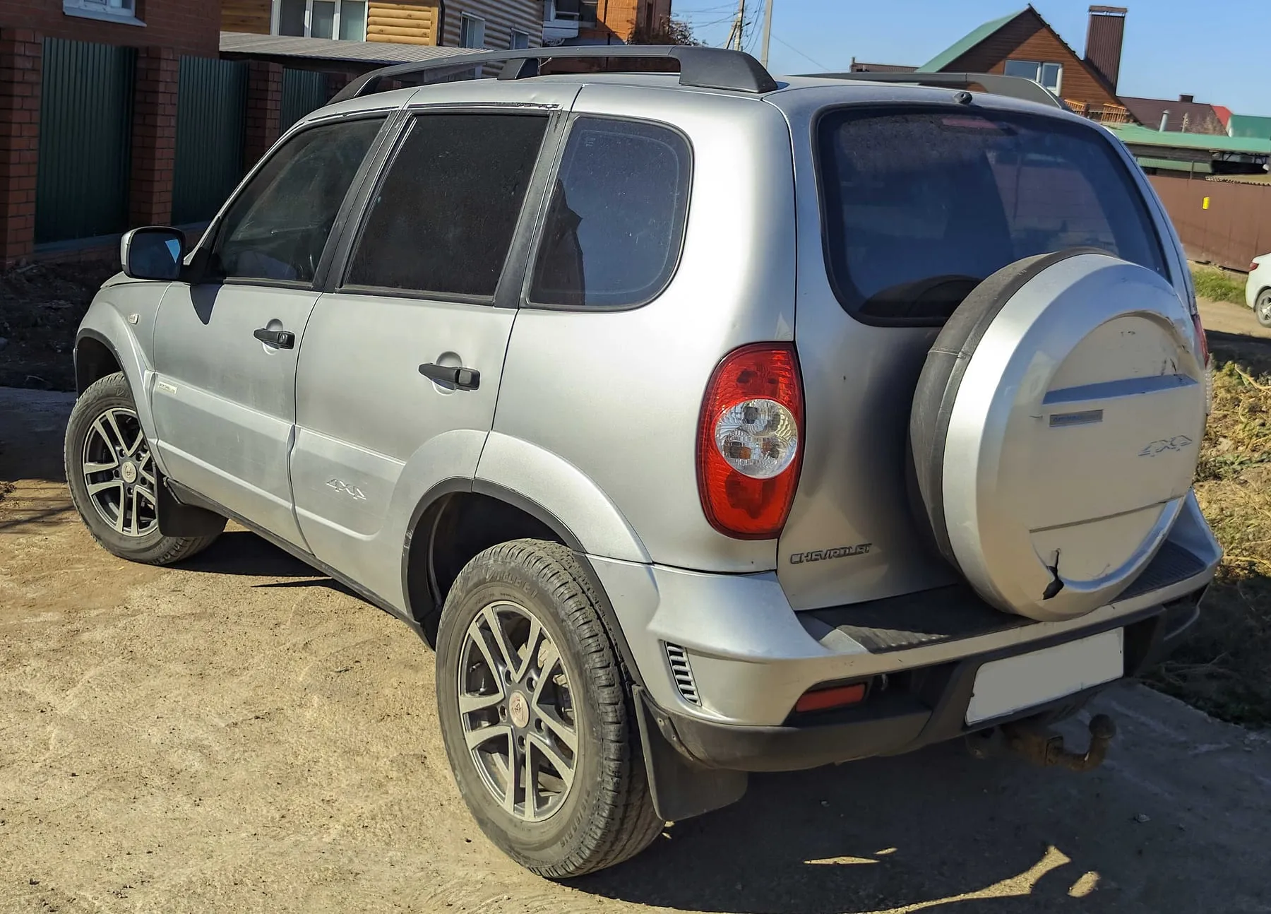 Chevrolet Niva 212300-55 2012 года, вид сзади
